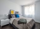 Purchase a new condo with a large bedroom